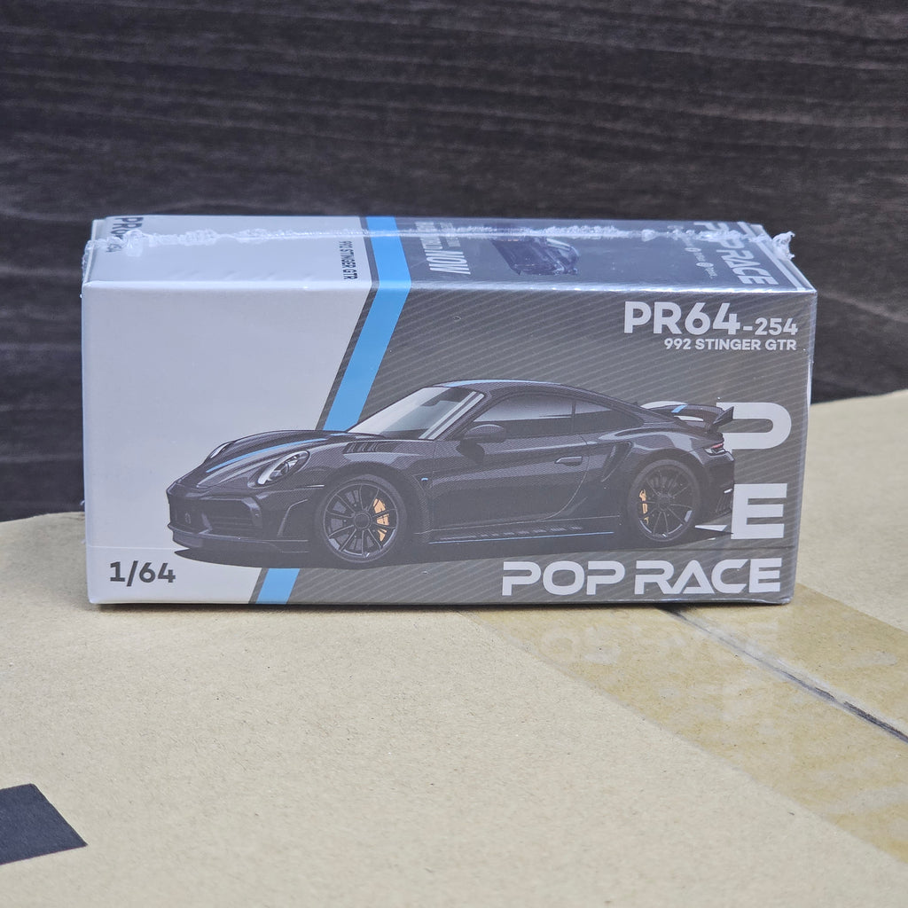 POP RACE 992 STINGER GTR CARBON EDITION BLUELINE 1/64 SEALED BOX
