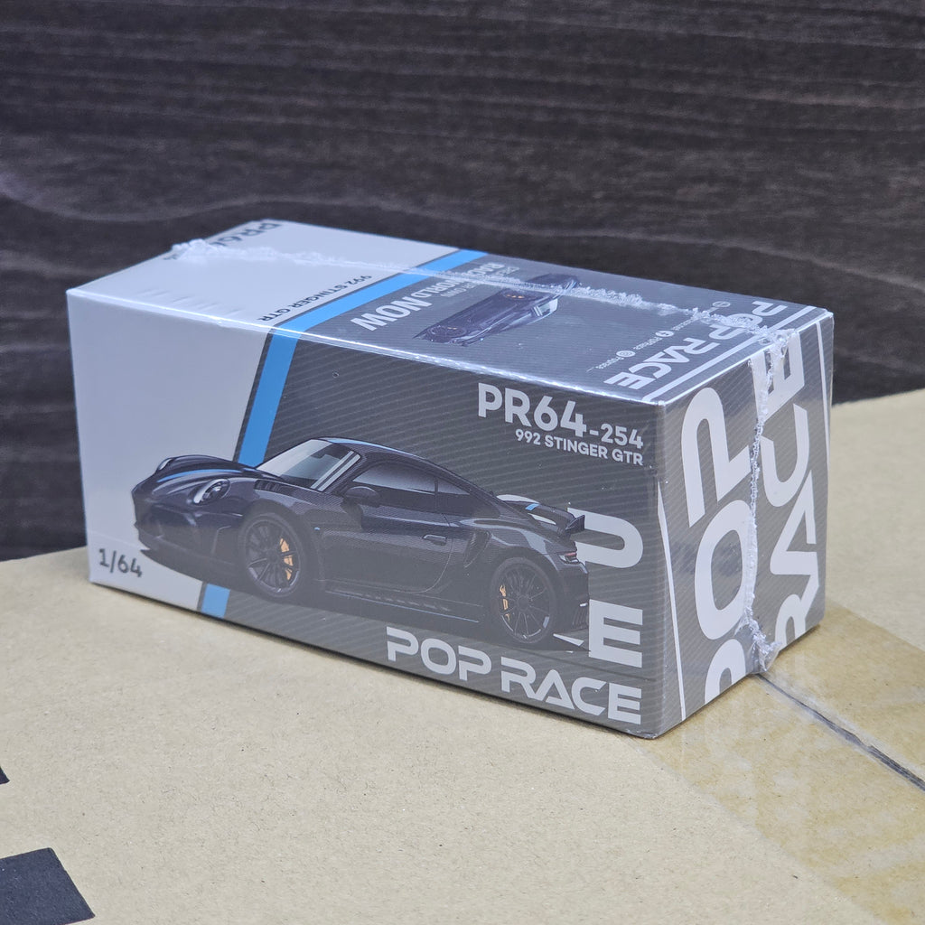POP RACE 992 STINGER GTR CARBON EDITION BLUELINE 1/64 SEALED BOX
