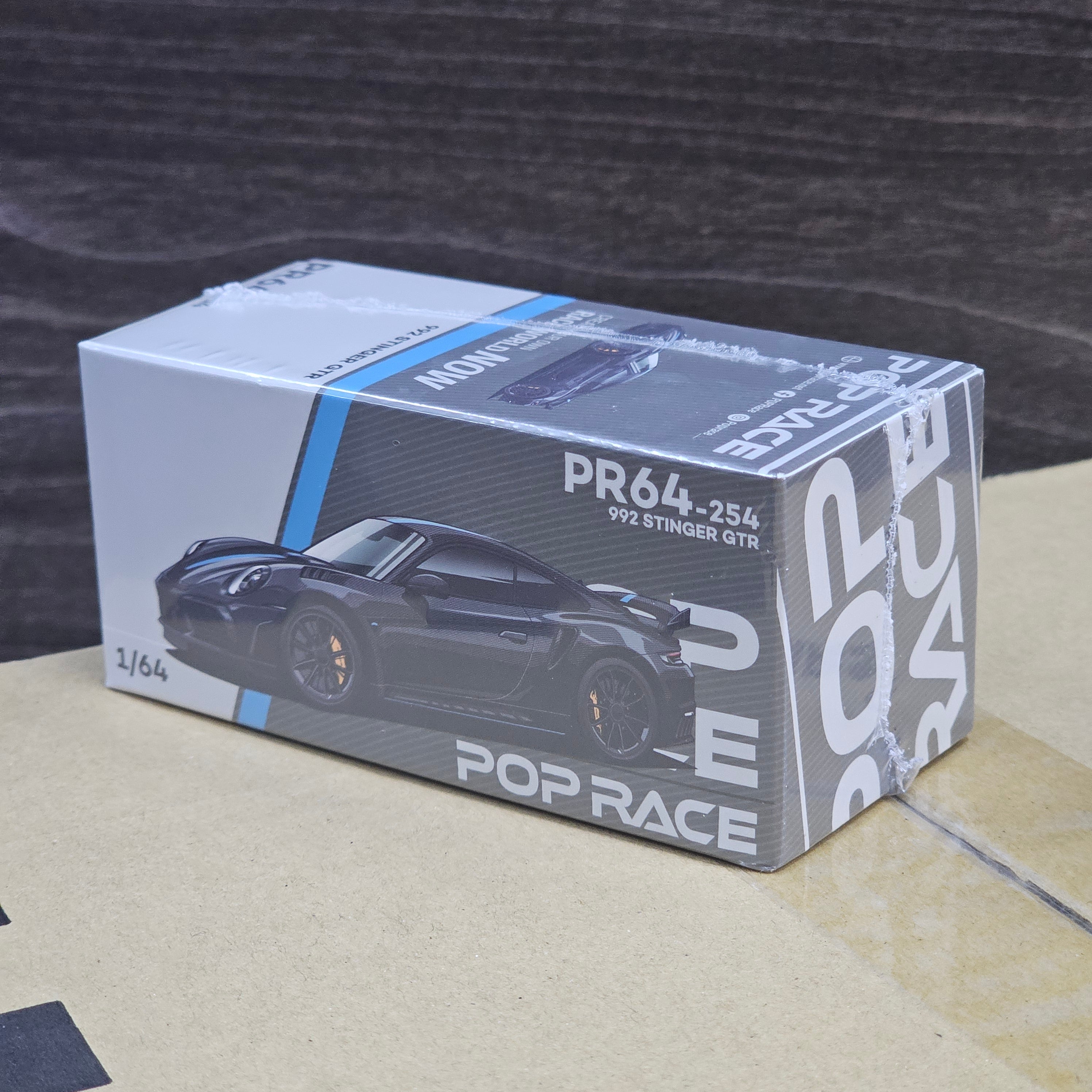 POP RACE 992 STINGER GTR CARBON EDITION BLUELINE 1/64 SEALED BOX